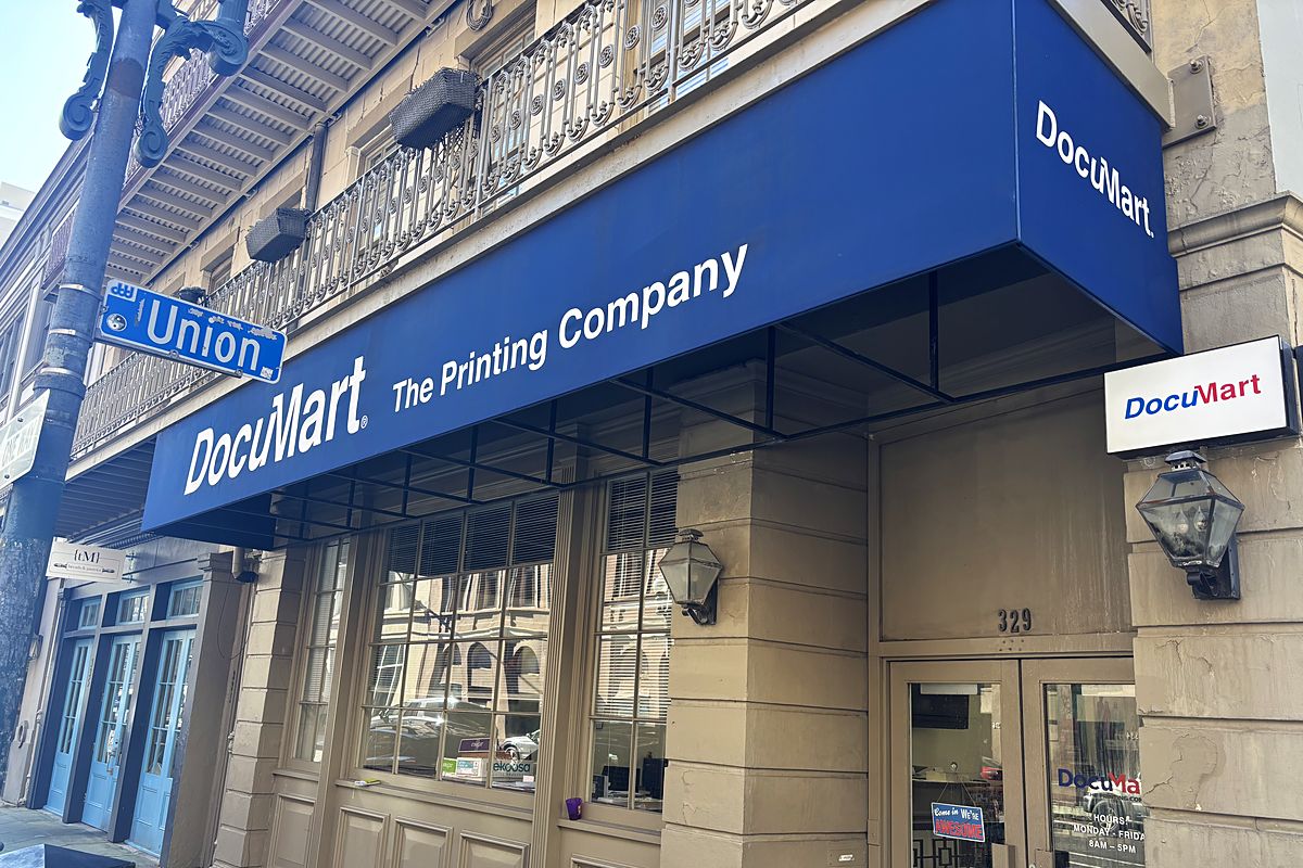 The DocuMart Downtown shop at 329 Baronne St, under its blue awning at the corner of Union